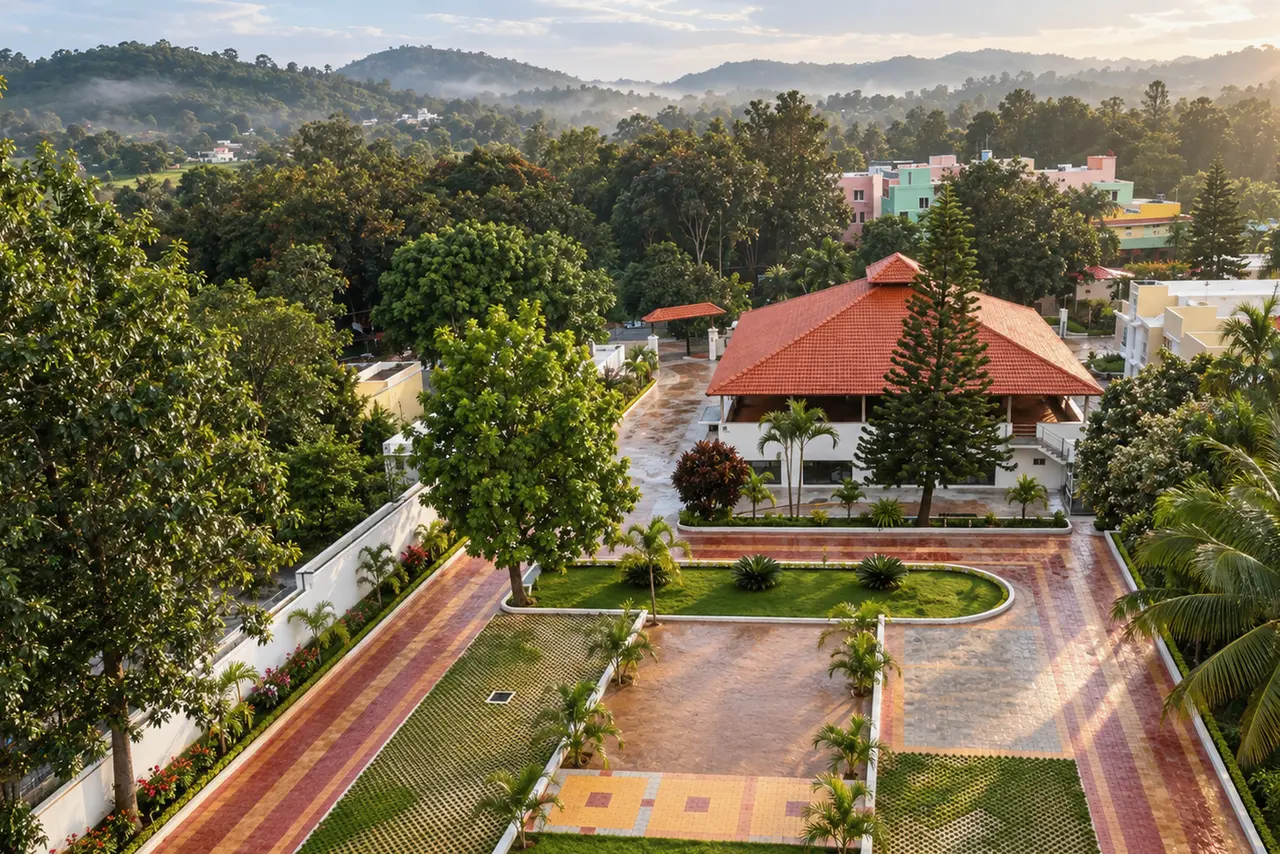 The campus from above: the tiled roof, the lawns and the drive